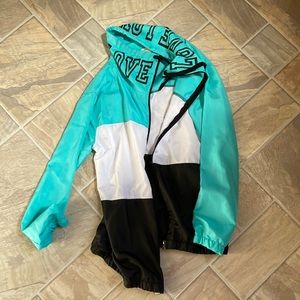 Seafoam green/teal, white and black light weight jacket